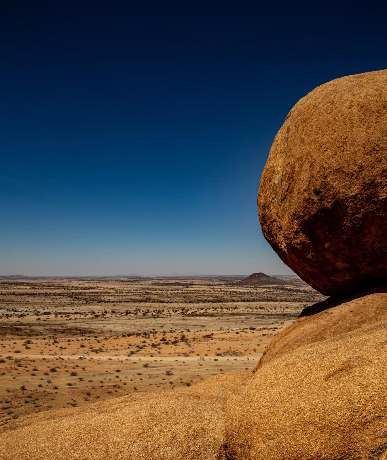 Large rock formation in an arid southern African landscape